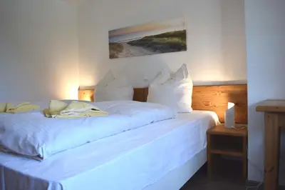 Ein Bett oder Betten in einem Zimmer der Unterkunft Resi A4