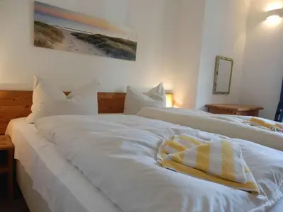 Ein Bett oder Betten in einem Zimmer der Unterkunft Resi A4