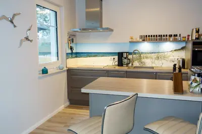 Küche/Küchenzeile in der Unterkunft Premiumhaus Bodden und Mehr-Brise