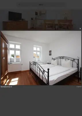 Ein Bett oder Betten in einem Zimmer der Unterkunft Gästehaus Schimmel´s