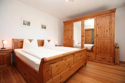 Ein Bett oder Betten in einem Zimmer der Unterkunft Gästehaus Schimmel´s