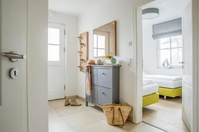 Ein Bett oder Betten in einem Zimmer der Unterkunft Ferienwohnung Düne 2.2