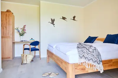 Ein Bett oder Betten in einem Zimmer der Unterkunft Ferienhaus Graukranich 41