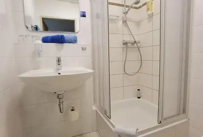 Ein Badezimmer in der Unterkunft Pension Boddenblick