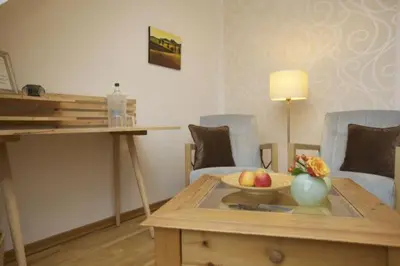 Ein Sitzbereich in der Unterkunft Schimmels Pension