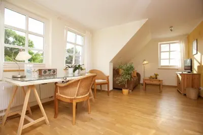 Ein Sitzbereich in der Unterkunft Schimmels Pension