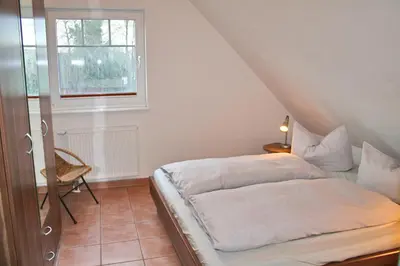 Ein Bett oder Betten in einem Zimmer der Unterkunft Ferienhaus 