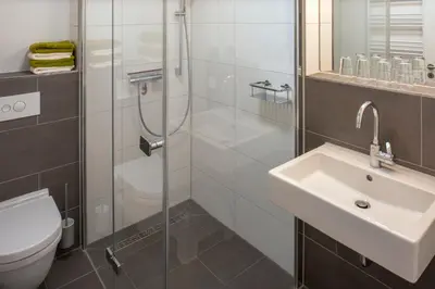 Ein Badezimmer in der Unterkunft Haus am Deich Ferienwohnungen
