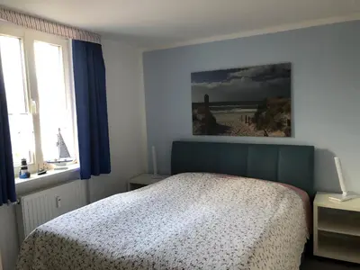 Ein Bett oder Betten in einem Zimmer der Unterkunft Darsskrabbe