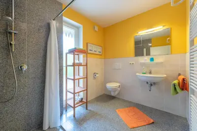 Ein Badezimmer in der Unterkunft Ferienhaus Lütten Kulli - 2