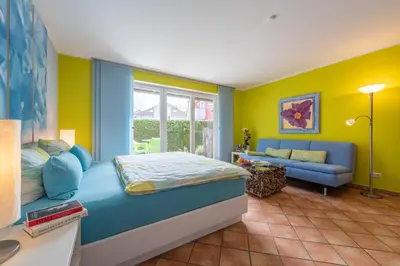 Ein Bett oder Betten in einem Zimmer der Unterkunft Ferienhaus Lütten Kulli - 2