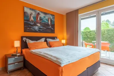 Ein Bett oder Betten in einem Zimmer der Unterkunft Ferienhaus Lütten Kulli - 2