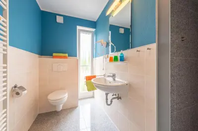 Ein Badezimmer in der Unterkunft Ferienhaus Lütten Kulli - 2