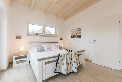 Ein Bett oder Betten in einem Zimmer der Unterkunft Strandhaus Lindenstraße