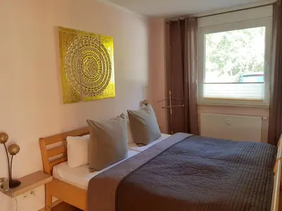 Ein Bett oder Betten in einem Zimmer der Unterkunft Darssurlaub App 5