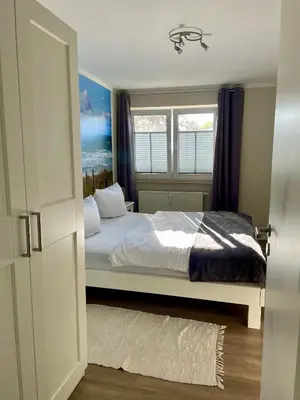 Ein Bett oder Betten in einem Zimmer der Unterkunft Sonnendeck 3