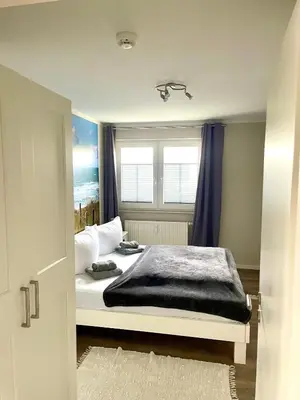 Ein Bett oder Betten in einem Zimmer der Unterkunft Sonnendeck 3