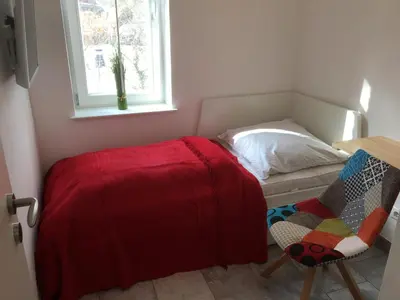Ein Bett oder Betten in einem Zimmer der Unterkunft Wolffs-Idyll