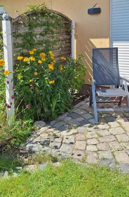Ein Garten an der Unterkunft Boddenpieper