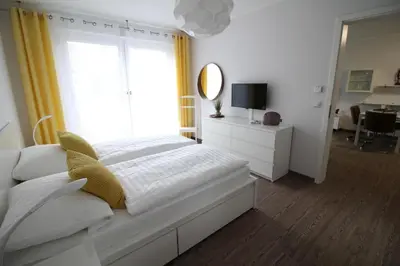 Ein Bett oder Betten in einem Zimmer der Unterkunft Dock 31