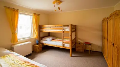 Ein Bett oder Betten in einem Zimmer der Unterkunft Sina