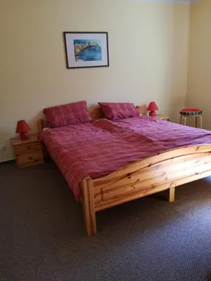 Ein Bett oder Betten in einem Zimmer der Unterkunft Sina