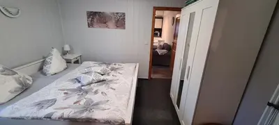 Ein Bett oder Betten in einem Zimmer der Unterkunft Ferienwohnung 