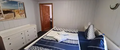 Ein Bett oder Betten in einem Zimmer der Unterkunft Ferienwohnung 