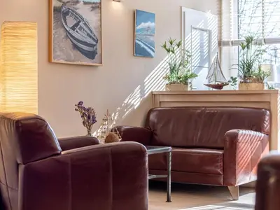 Ein Sitzbereich in der Unterkunft Hotel Stone