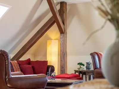 Ein Sitzbereich in der Unterkunft Hotel Stone