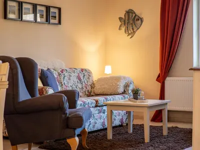 Ein Sitzbereich in der Unterkunft Hotel Stone