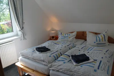 Ein Bett oder Betten in einem Zimmer der Unterkunft Am Ostseestrand