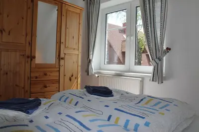 Ein Bett oder Betten in einem Zimmer der Unterkunft Am Ostseestrand