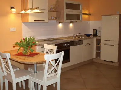 Küche/Küchenzeile in der Unterkunft Ferienhaus Fischlandperle