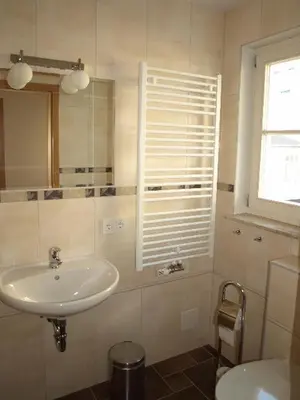 Ein Badezimmer in der Unterkunft Ferienhaus Fischlandperle