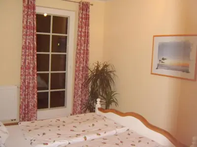 Ein Bett oder Betten in einem Zimmer der Unterkunft Ferienwohnung Fischerkoje
