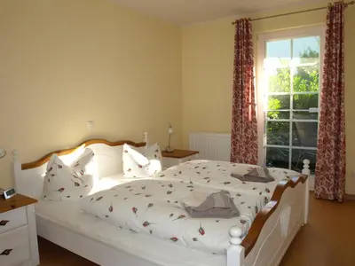 Ein Bett oder Betten in einem Zimmer der Unterkunft Ferienwohnung Fischerkoje