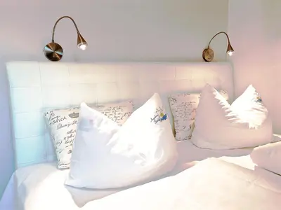 Ein Bett oder Betten in einem Zimmer der Unterkunft Darssmuschel Dierhagen-Strand - Haus 2