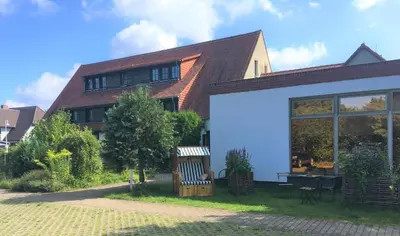 Ein Garten an der Unterkunft Hotel-Pension Seeadler