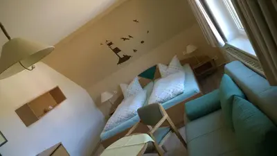 Ein Sitzbereich in der Unterkunft Hotel-Pension Seeadler