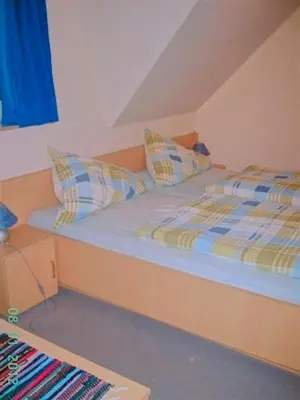Ein Bett oder Betten in einem Zimmer der Unterkunft Am Deich 33
