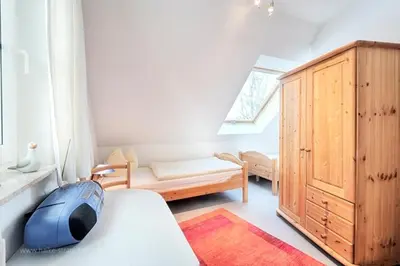 Ein Bett oder Betten in einem Zimmer der Unterkunft Am Deich 20