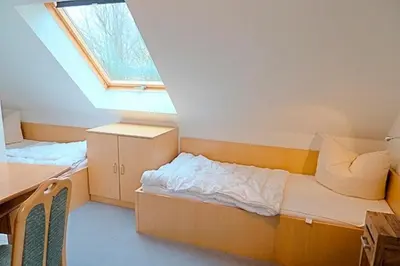 Ein Bett oder Betten in einem Zimmer der Unterkunft Am Deich 49