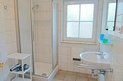 Ein Badezimmer in der Unterkunft Am Deich 49