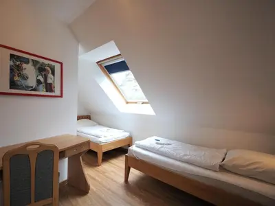 Ein Bett oder Betten in einem Zimmer der Unterkunft Am Deich 39