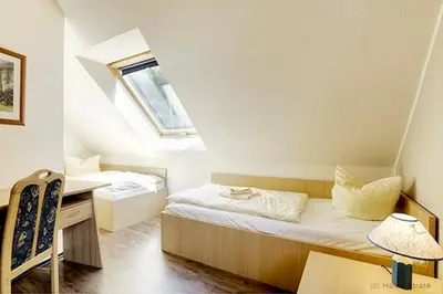 Ein Bett oder Betten in einem Zimmer der Unterkunft Am Deich 34