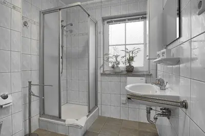 Ein Badezimmer in der Unterkunft Am Deich 43