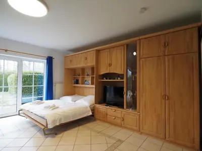 Ein Bett oder Betten in einem Zimmer der Unterkunft Mensendiek, Anita, App