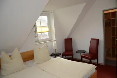 Ein Bett oder Betten in einem Zimmer der Unterkunft Am Deich 15