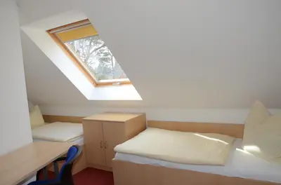Ein Bett oder Betten in einem Zimmer der Unterkunft Am Deich 15